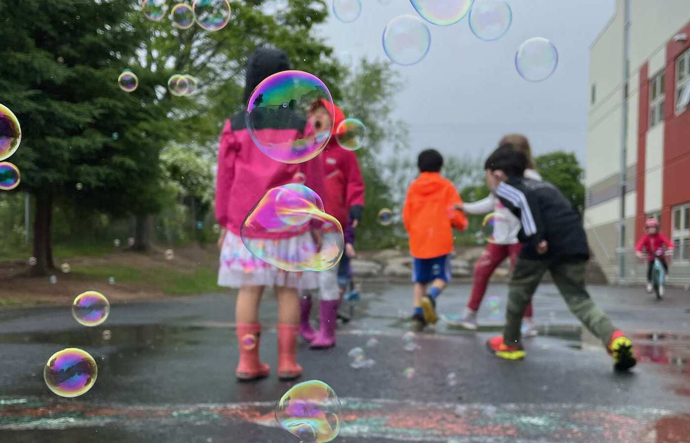 Children playing with bubbles